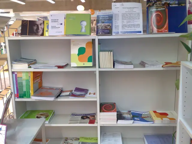 In this image I can see number of books on the shelves. On the top side of this image I can see few...