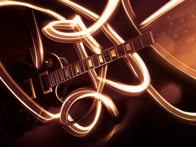 In this image there is a guitar and some graffiti around.